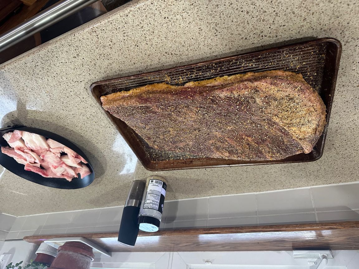 Seasoned and trimmed brisket